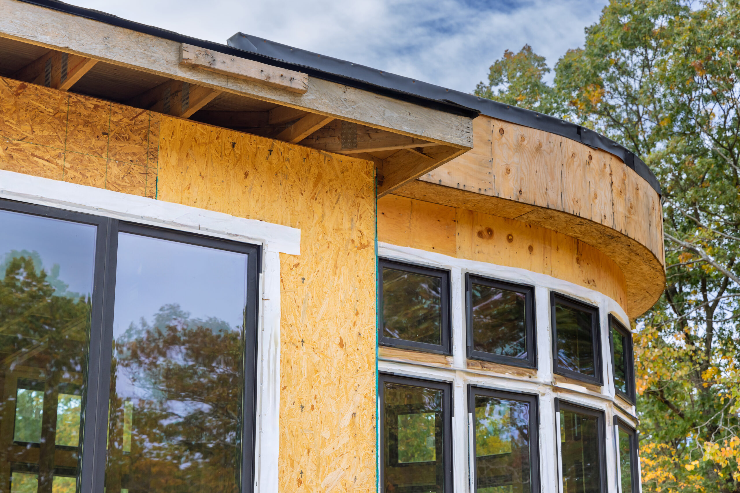 During construction of house, the joist framework has been installed, along with gutter holders soffit fascia trim.